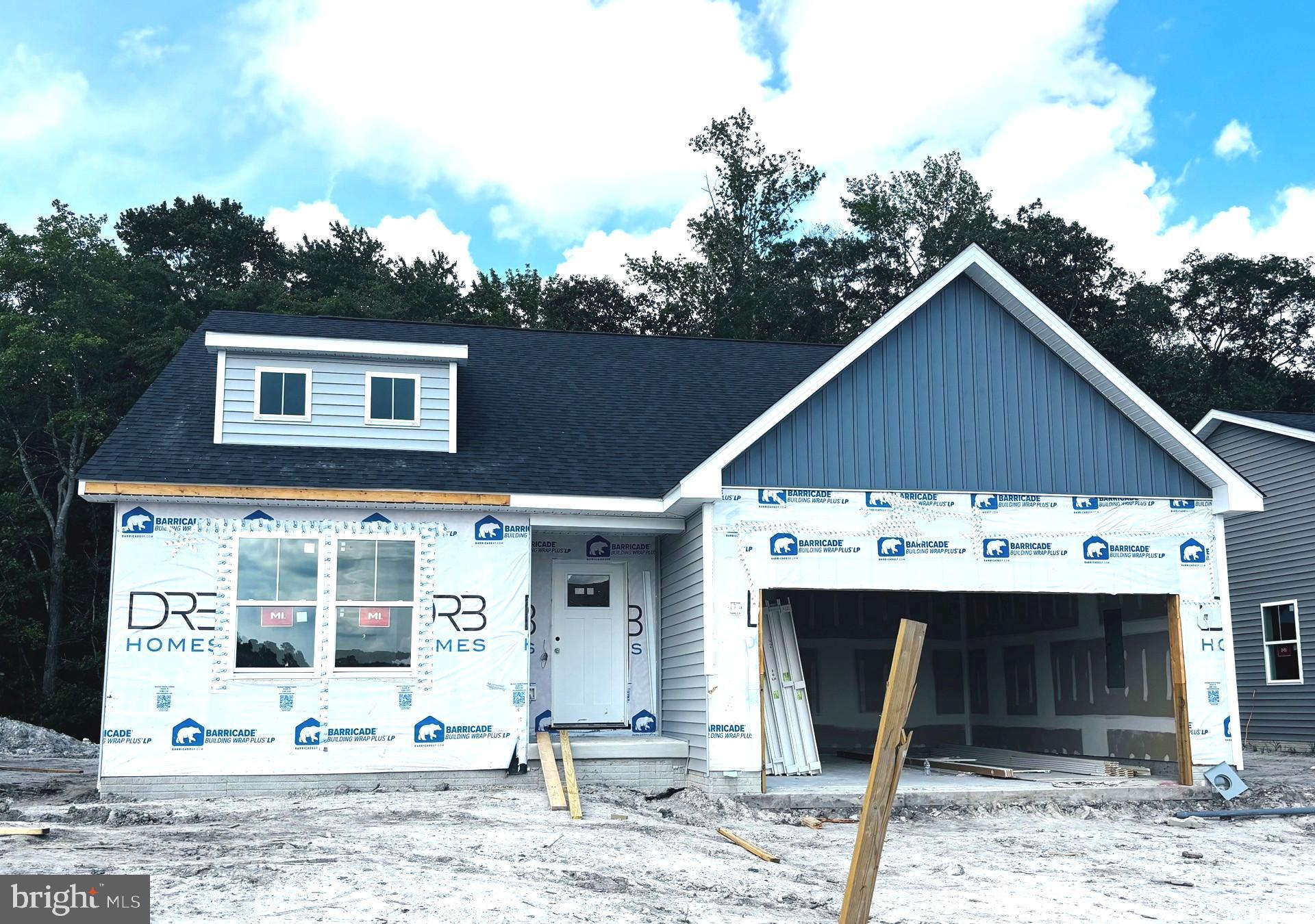 727 R Wilson Loop Georgetown, DE 19947 - Photo 2 of 29 a front view of a house