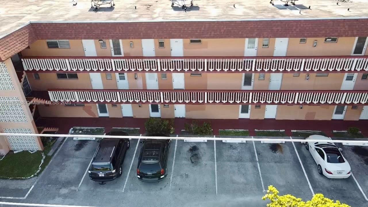 a view of a brick house with a window