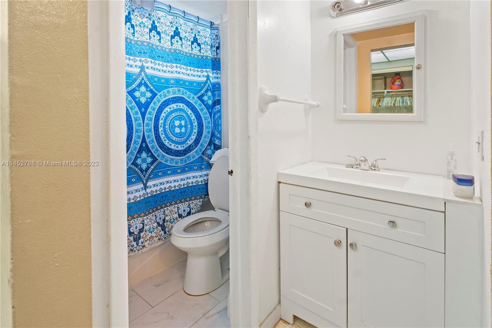 Norland Miami, FL 33179 - Photo 12 of 15 a bathroom with a toilet and a sink