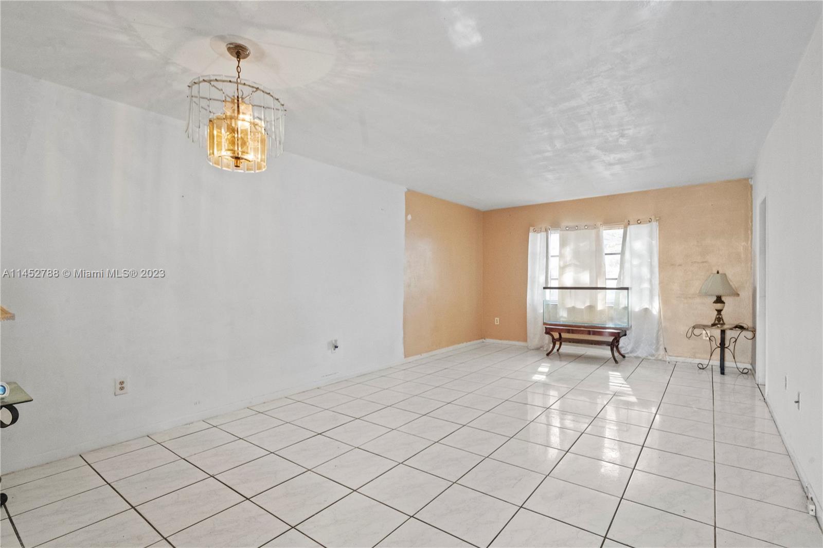 Norland Miami, FL 33179 - Photo 7 of 15 a view of an empty room with a window