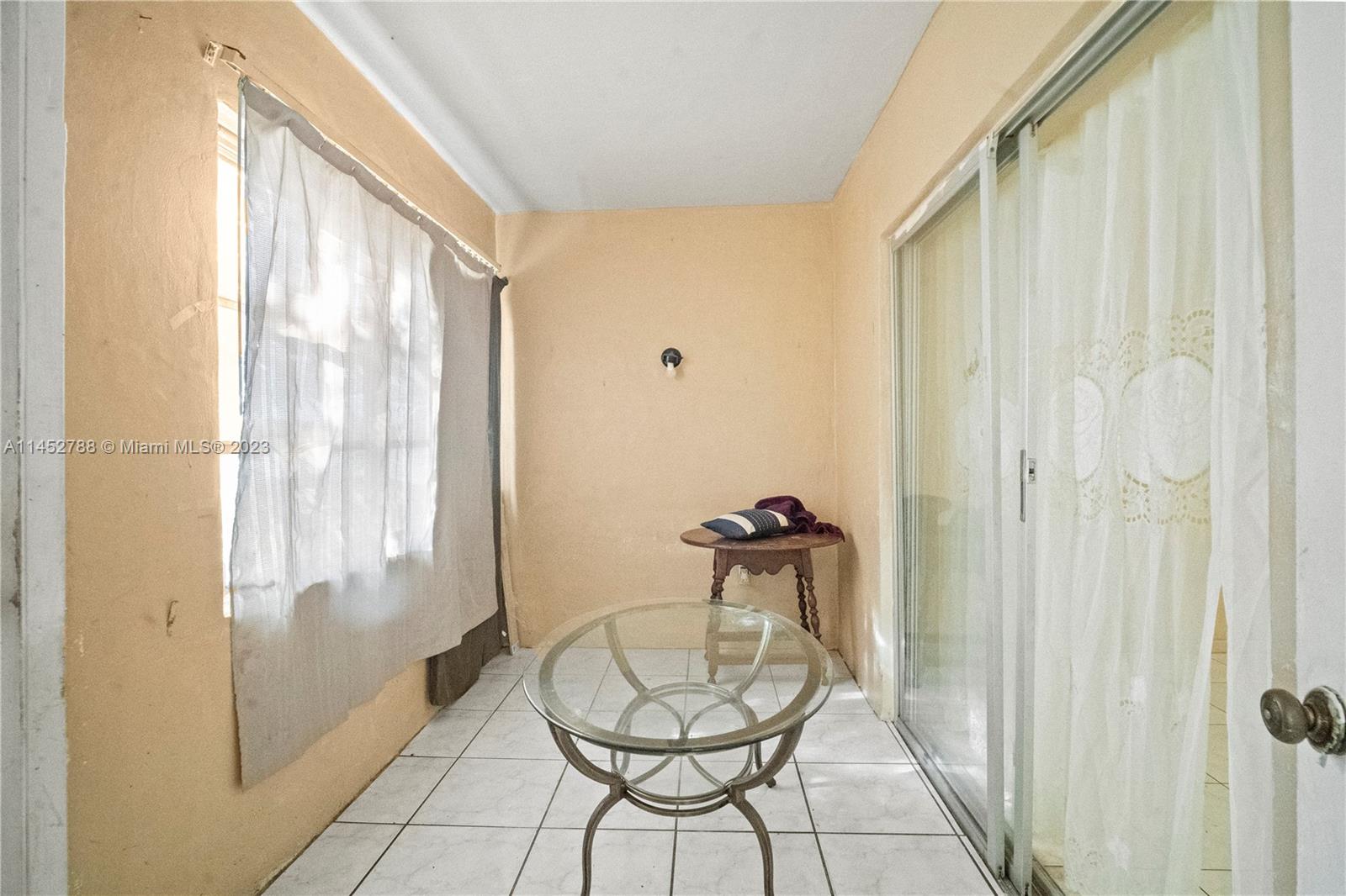 Norland Miami, FL 33179 - Photo 10 of 15 a room with furniture and a window