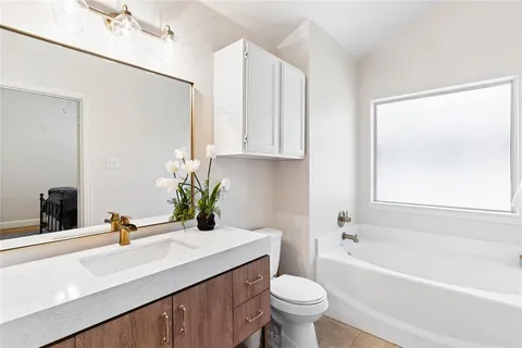 a bathroom with a sink and a bathtub
