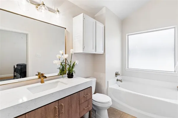 a bathroom with a sink and a bathtub