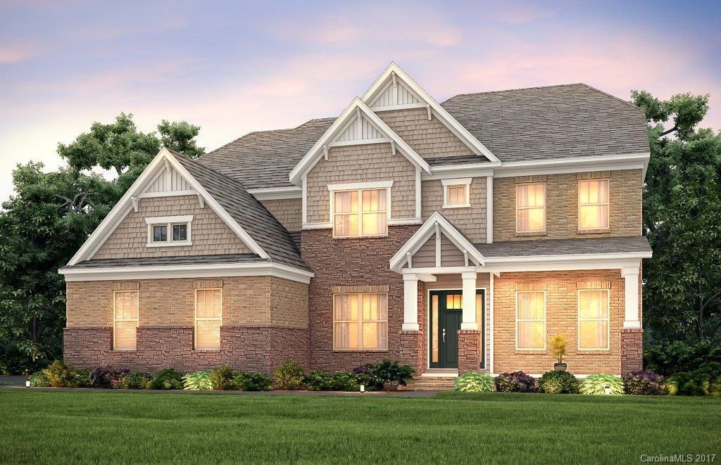 7003 Fallondale Road, Unit MB515 Waxhaw, NC 28173 - Photo 2 of 10 a front view of a house with a yard