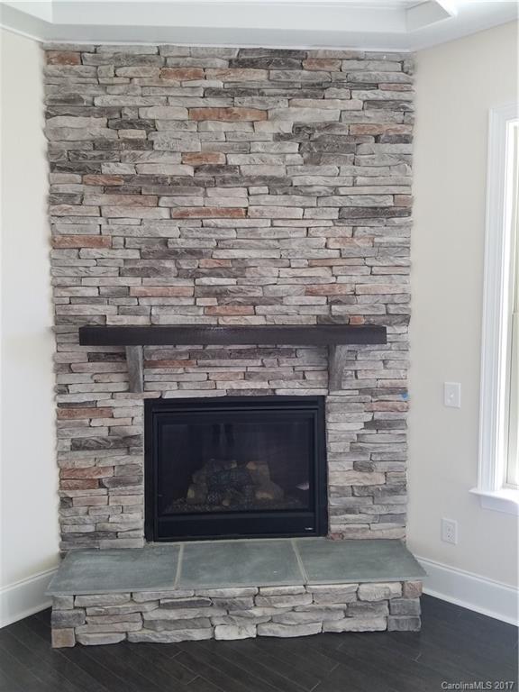 7003 Fallondale Road, Unit MB515 Waxhaw, NC 28173 - Photo 6 of 10 a room with a fireplace