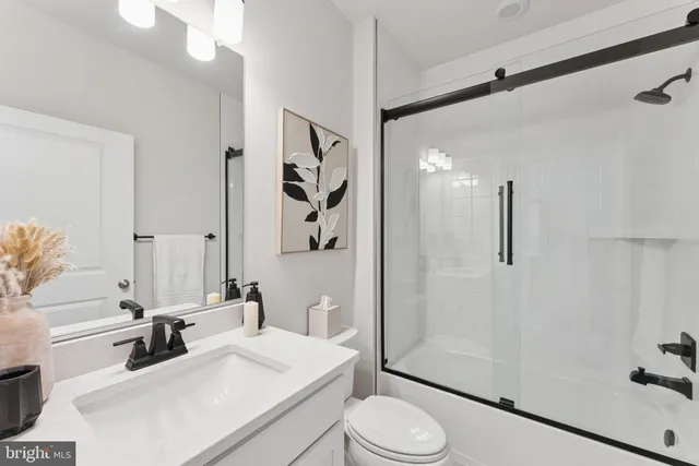 a dining room with a table and chairs