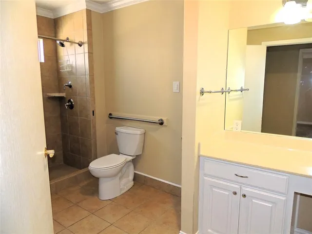 a bathroom with a toilet and a sink