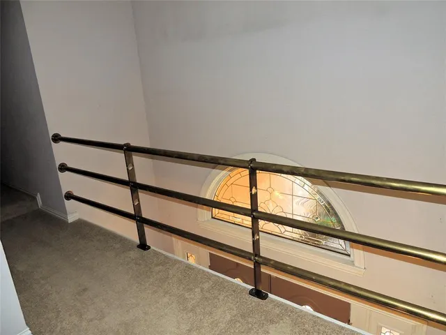 a view of outdoor space with wooden floor and window