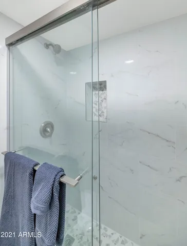 a view of a swimming pool with a yard