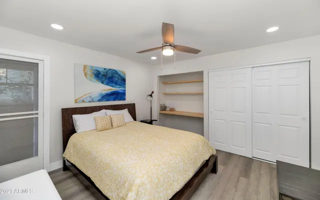 a view of a yard with large trees