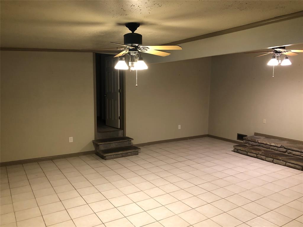 210 Jones Road Graford, TX 76449 - Photo 4 of 25 a view of an empty room