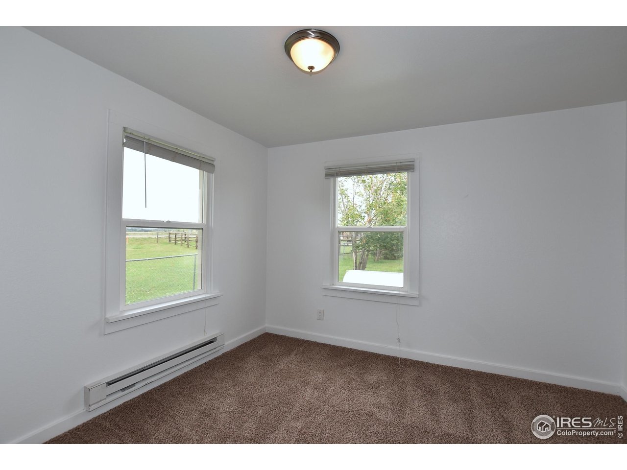 1340 North Taft Hill Road Fort Collins, CO 80521 - Photo 30 of 40 a view of an empty room with a window