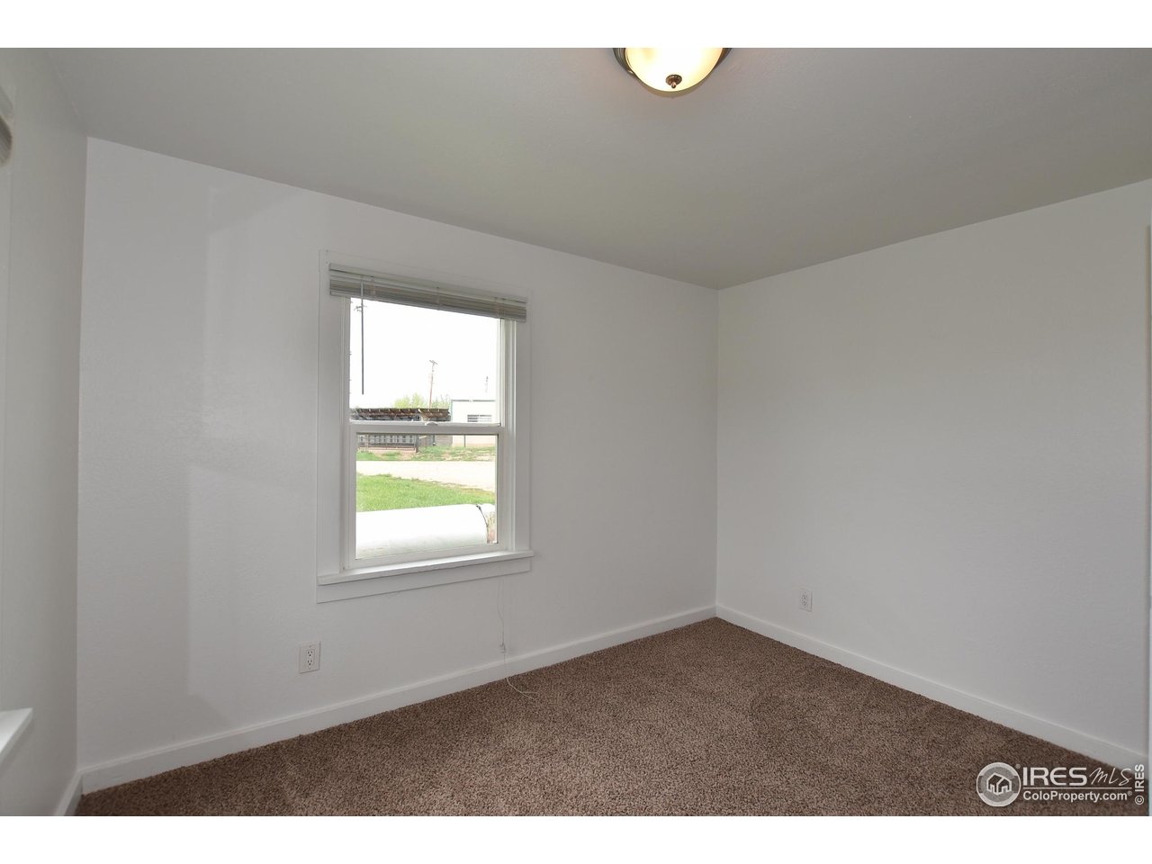 1340 North Taft Hill Road Fort Collins, CO 80521 - Photo 31 of 40 a view of an empty room and window