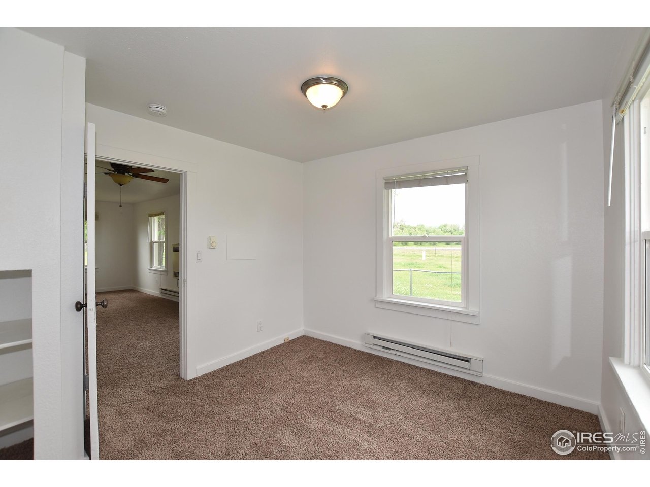 1340 North Taft Hill Road Fort Collins, CO 80521 - Photo 32 of 40 a view of an empty room with a window