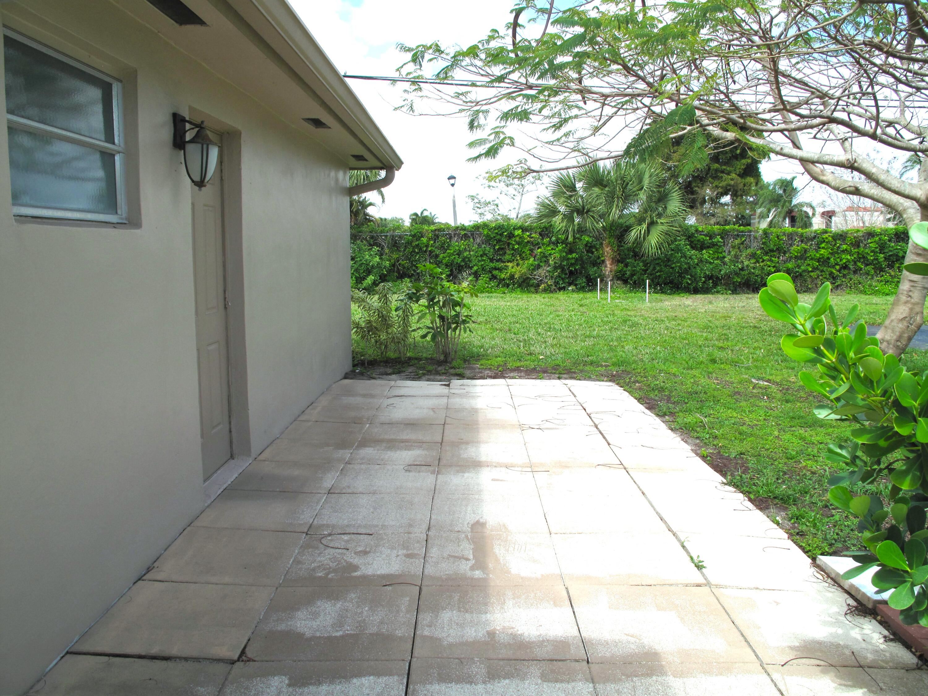 1295 High Point Place North, Unit A Delray Beach, FL 33445 - Photo 22 of 42 Back Yard Patio (3)