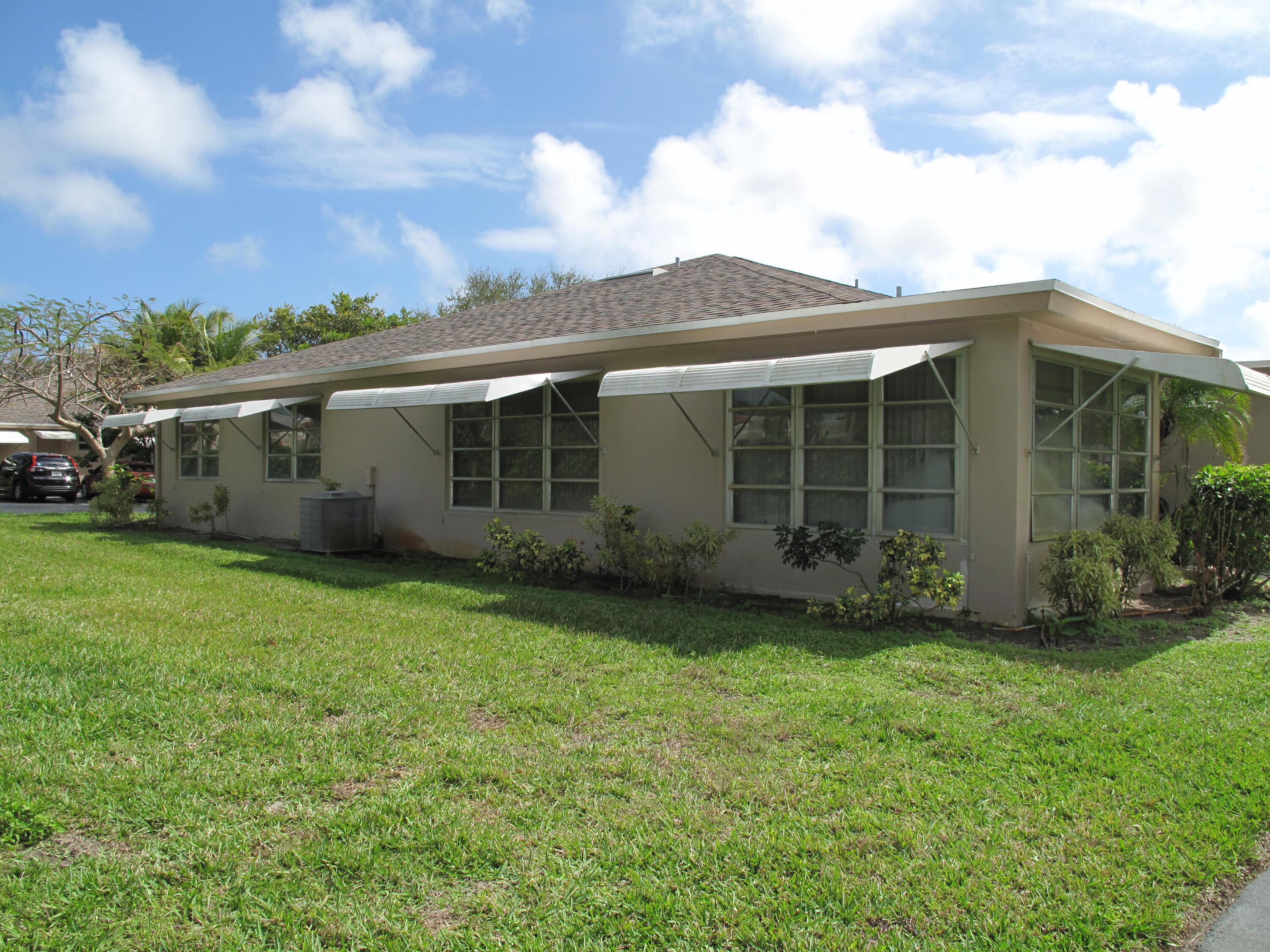 1295 High Point Place North, Unit A Delray Beach, FL 33445 - Photo 26 of 42 Side view of villa