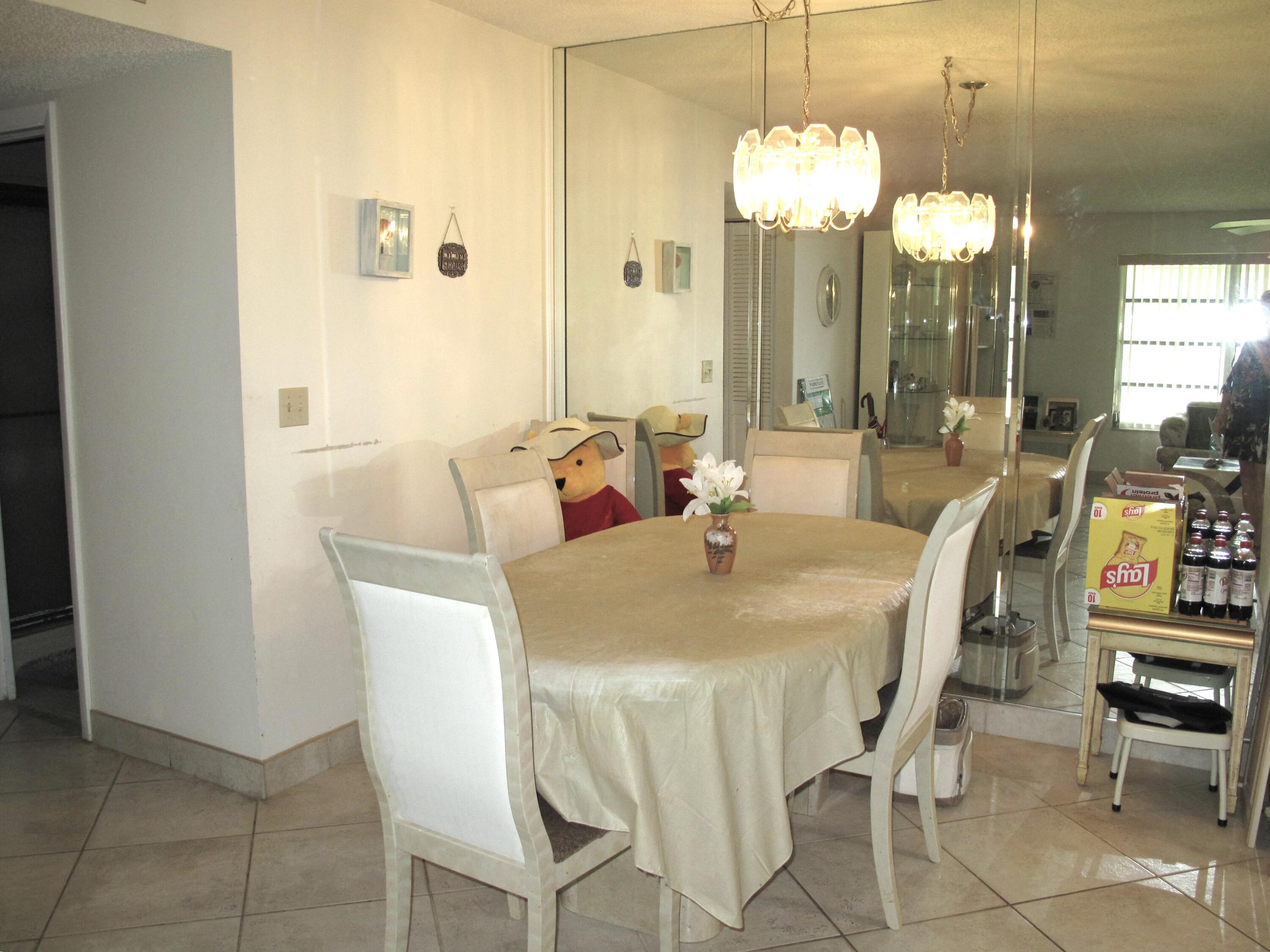 1295 High Point Place North, Unit A Delray Beach, FL 33445 - Photo 5 of 42 Dining area