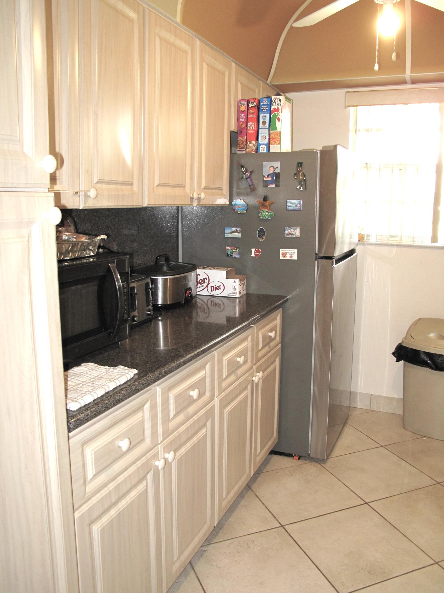 1295 High Point Place North, Unit A Delray Beach, FL 33445 - Photo 6 of 42 Galley Kitchen (1)