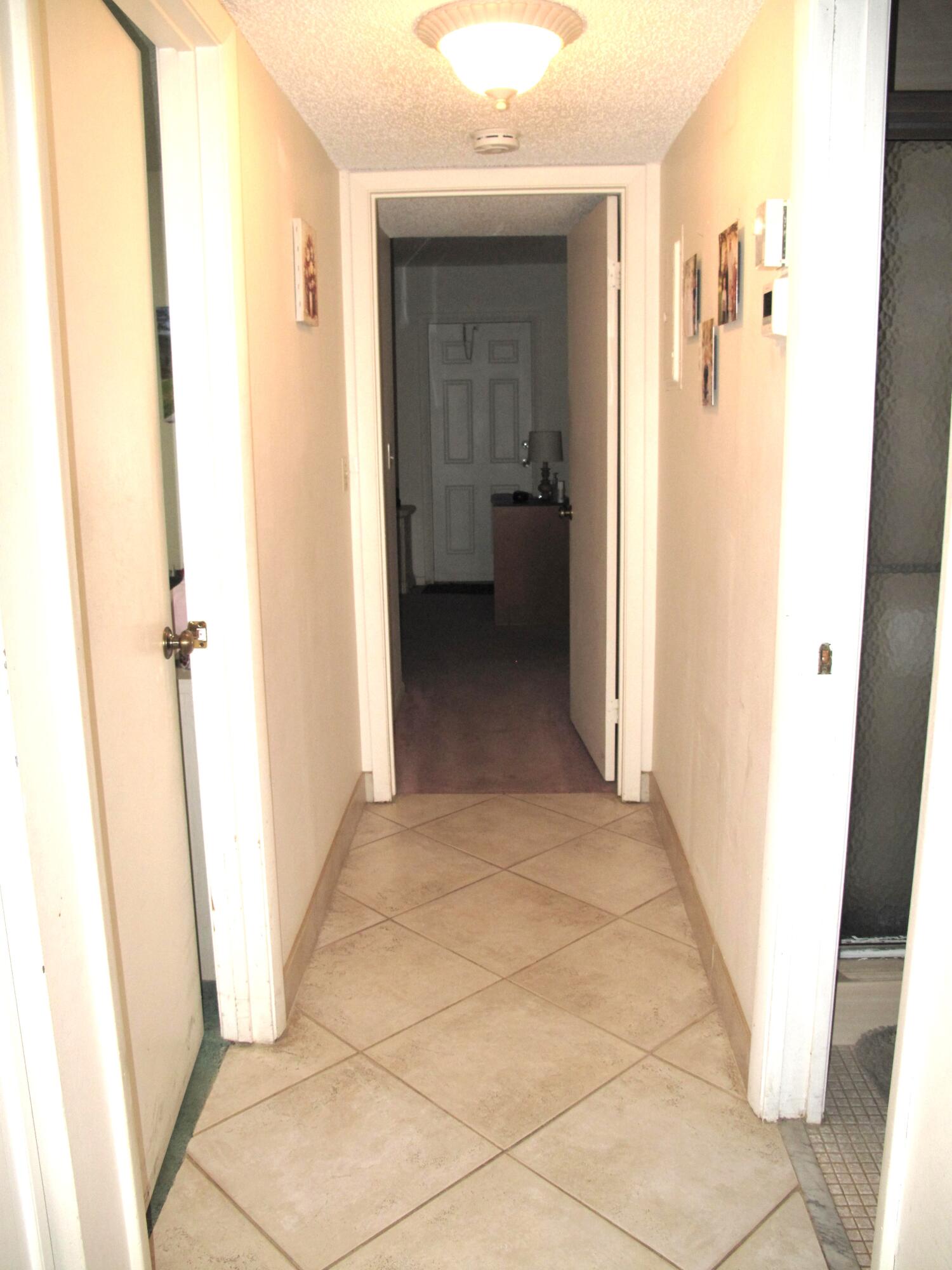 1295 High Point Place North, Unit A Delray Beach, FL 33445 - Photo 9 of 42 Hallway