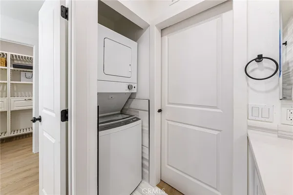 a bathroom with a granite countertop mirror and a sink