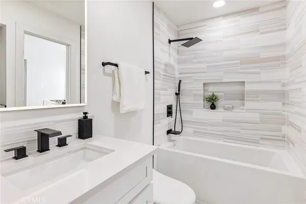a bathroom with a sink and a bathtub