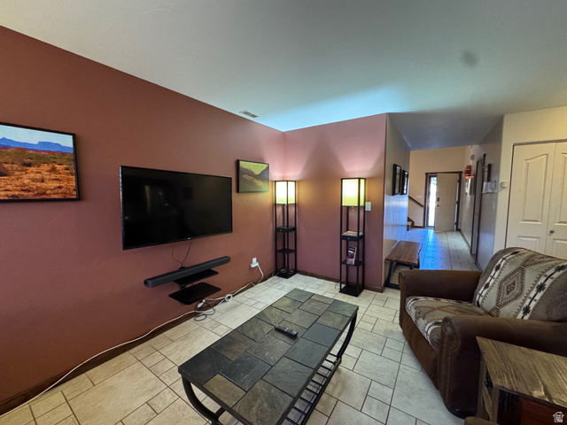 3439 Westwater Road Moab, UT 84532 - Photo 36 of 64 Living area with baseboards