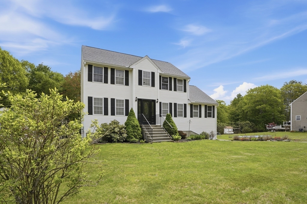 160 Gray Road Templeton, MA 01468 - Photo 34 of 42 a front view of a house with a garden