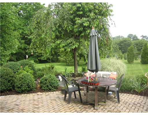 1 Freeborn Road Bristol, RI 02809 - Photo 10 of 12 Patio/Deck. Patio overlooking lush grounds and tree farm!