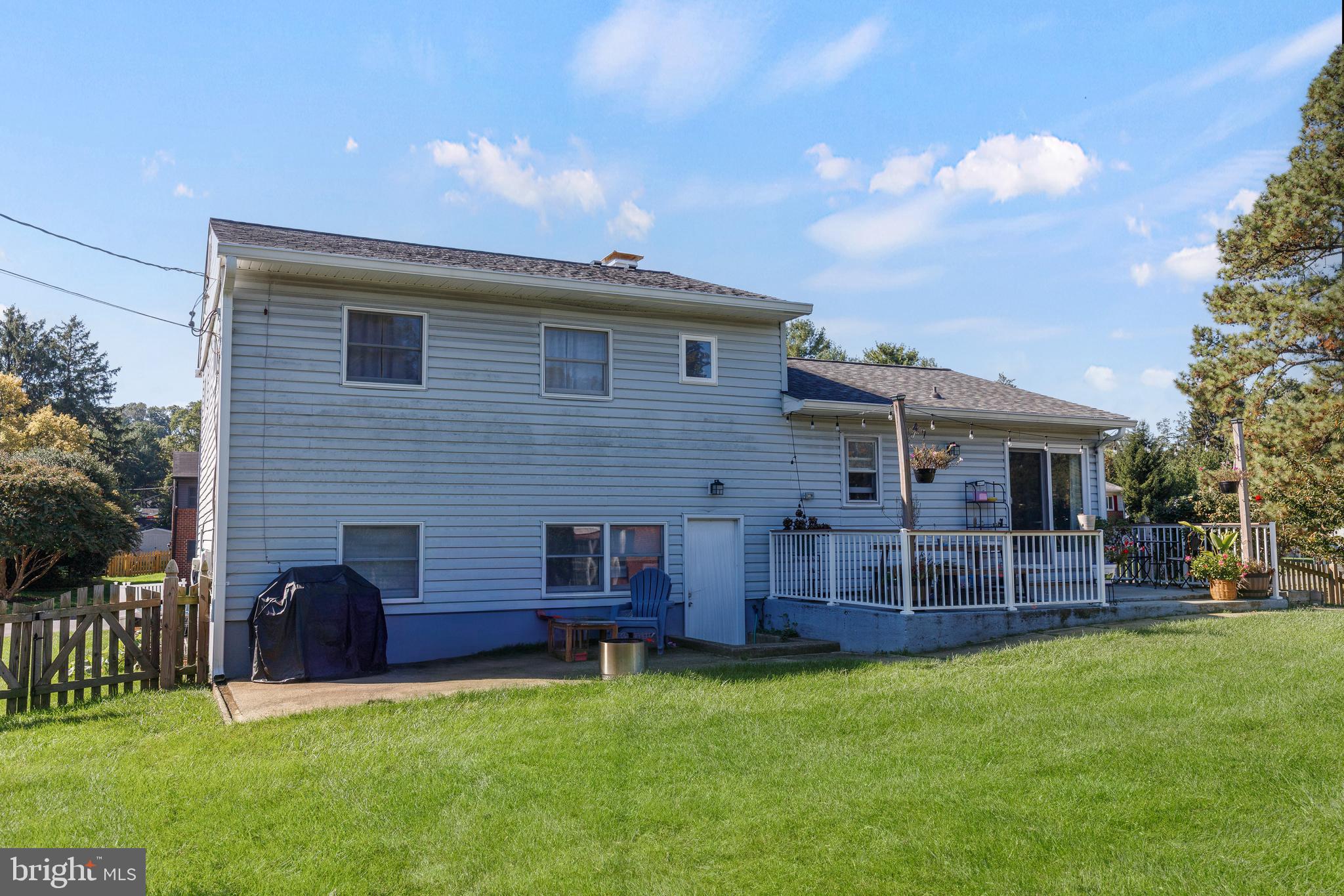 228 Quaker Ridge Road Lutherville-Timonium, MD 21093 - Photo 17 of 26 a view of a house with a backyard