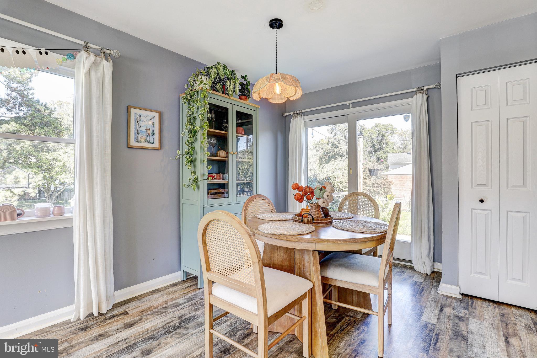 228 Quaker Ridge Road Lutherville-Timonium, MD 21093 - Photo 6 of 26 a dining room with furniture window and wooden floor