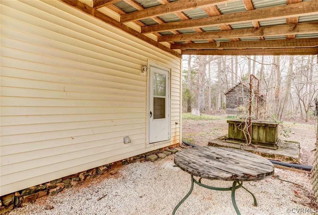 4625 Walton Road Louisa, VA 23093 - Photo 15 of 50 a view of a room with table and chairs