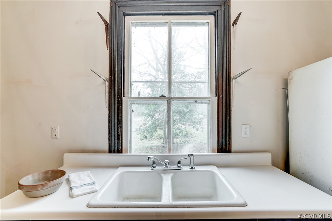 4625 Walton Road Louisa, VA 23093 - Photo 17 of 50 a view of a white bath tub sitting in a bathroom