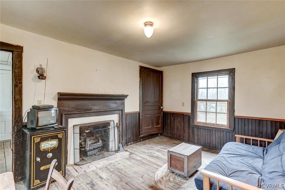 4625 Walton Road Louisa, VA 23093 - Photo 23 of 50 a living room with furniture and a fireplace