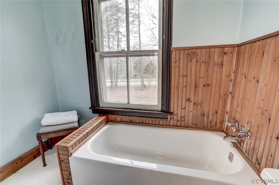 4625 Walton Road Louisa, VA 23093 - Photo 30 of 50 a bath tub sitting next to a window