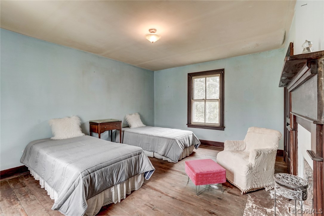 4625 Walton Road Louisa, VA 23093 - Photo 35 of 50 a bedroom with two beds and a window