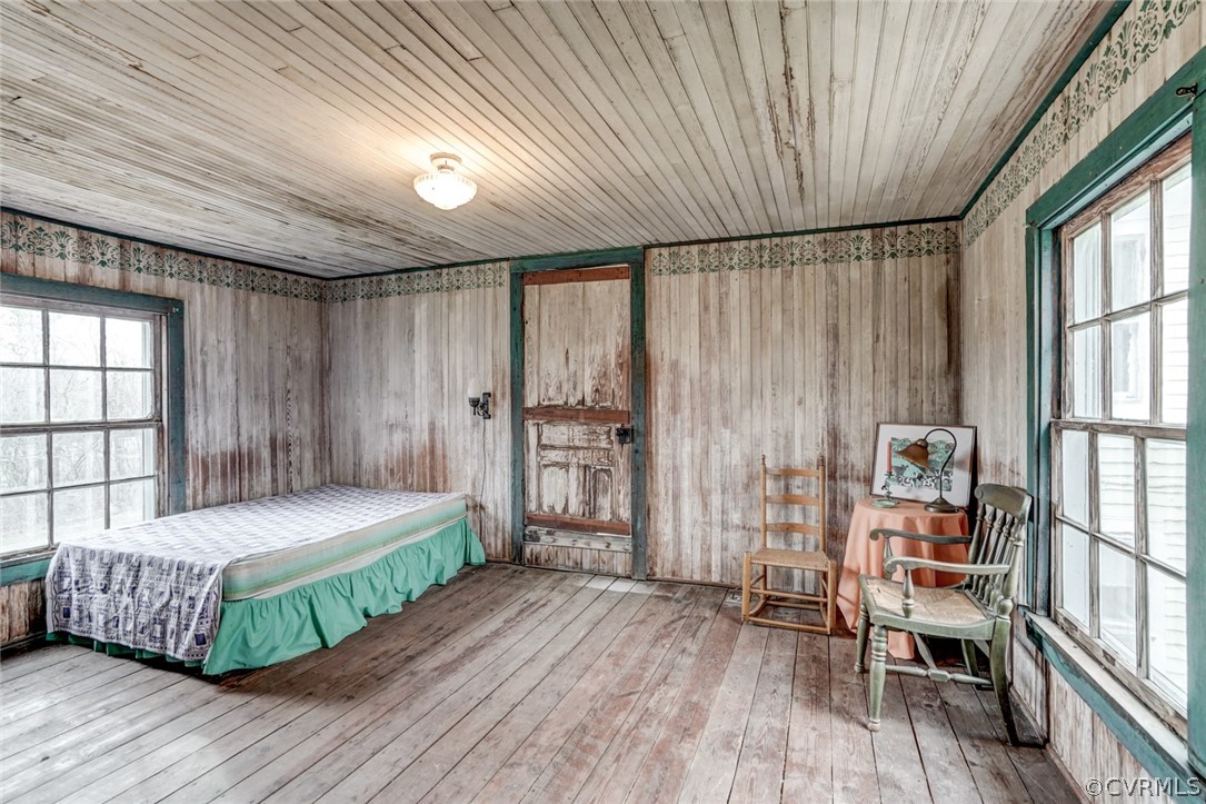 4625 Walton Road Louisa, VA 23093 - Photo 46 of 50 a bedroom with a bed and a large window