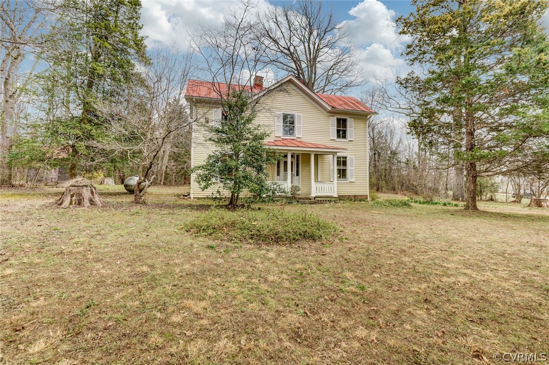 4625 Walton Road Louisa, VA 23093 - Photo 7 of 50 a front view of a house with a yard and trees