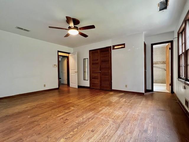 4541 Arcado Road Southwest Lilburn, GA 30047 - Photo 14 of 16 a view of empty room with wooden floor and fan