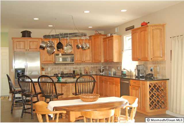 2567 High Point Road Manasquan, NJ 08736 - Photo 3 of 3 a large white kitchen with a large window