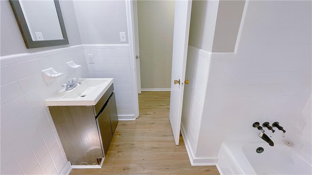 122 Barnesville Road Griffin, GA 30224 - Photo 15 of 19 a bathroom with a sink and a mirror