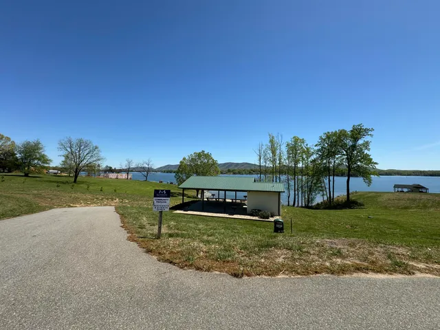 a garden with trees in the background