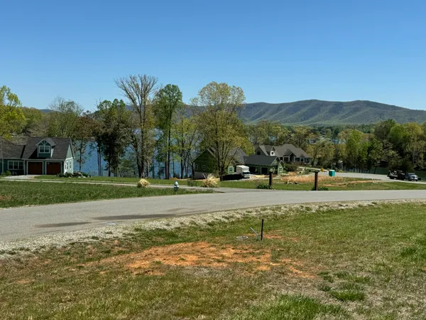 a view of a lake with a big yard