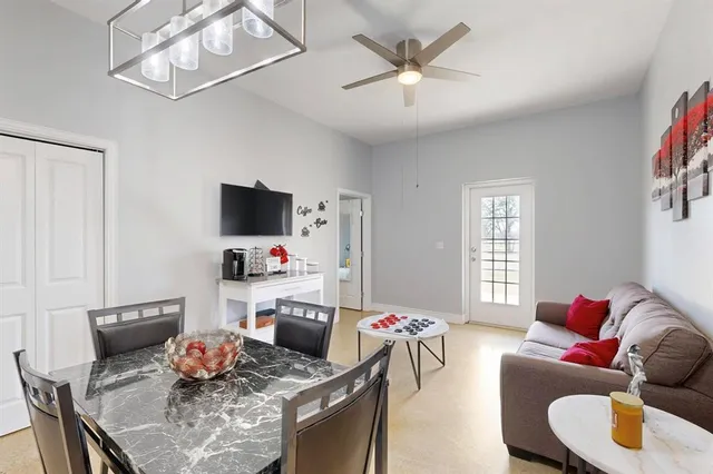 a kitchen with stainless steel appliances a stove a microwave and a refrigerator