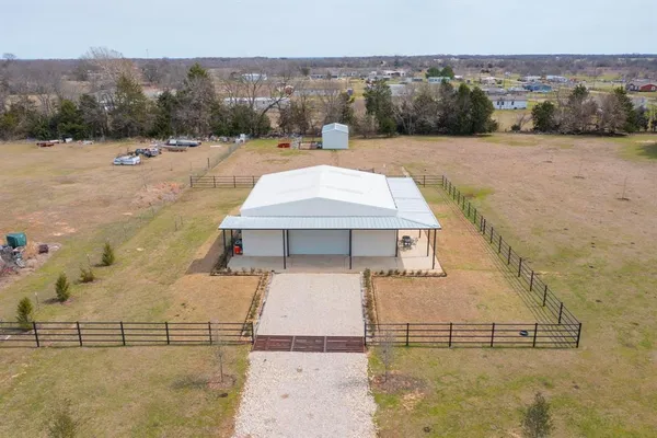 a view of a park with palm trees