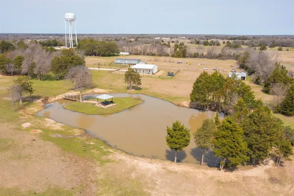 a view of a lake with an outdoor space