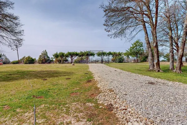 a view of a lake with trees