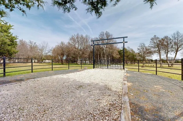 a view of a yard next to a building