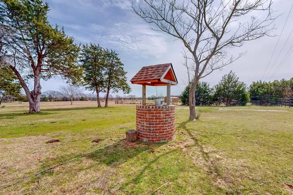 a view of a swimming pool with an ocean view