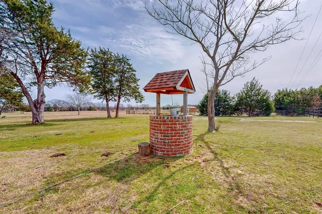 a view of a swimming pool with an ocean view