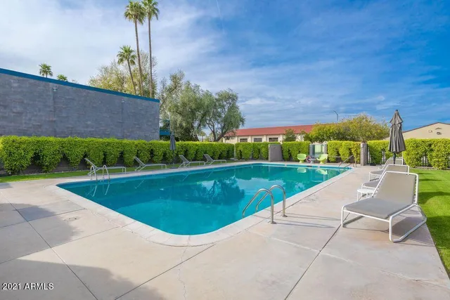 a garden view with a seating space
